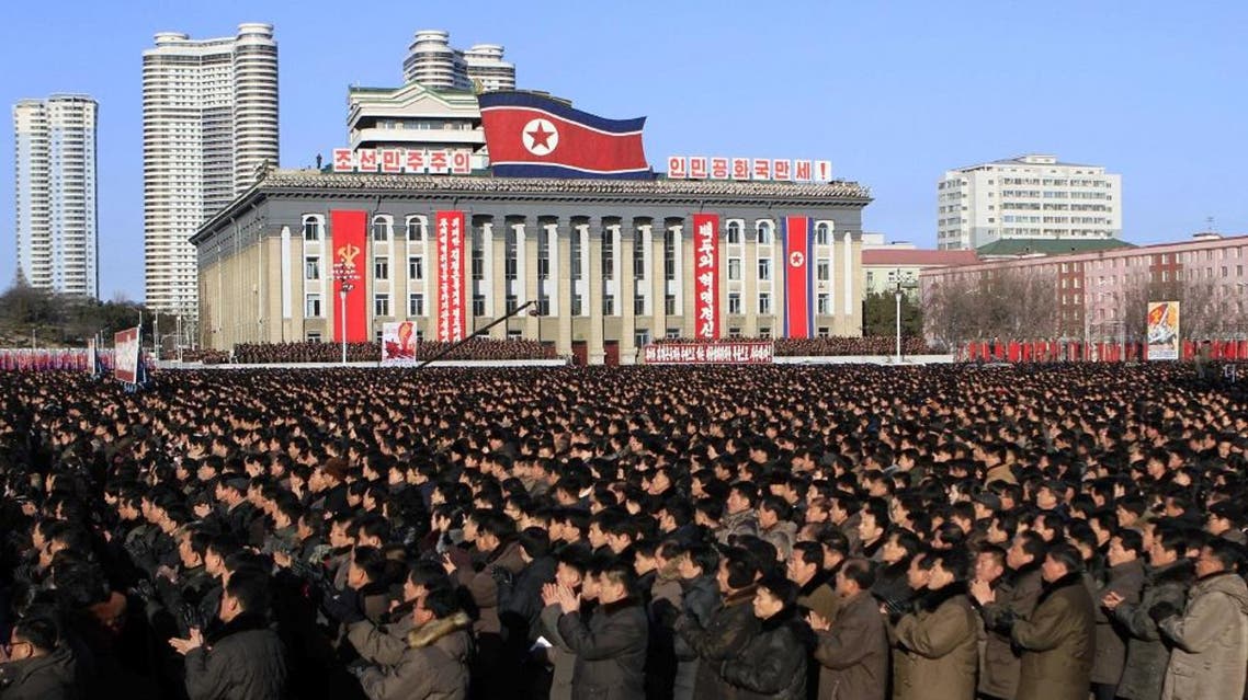 North Koreans gather at Kim Il Sung Square, following their leader Kim Jong Un's new year address in Pyongyang, North Korea, Tuesday, Jan. 5, 2016. (AP Photo/Jon Chol Jin)