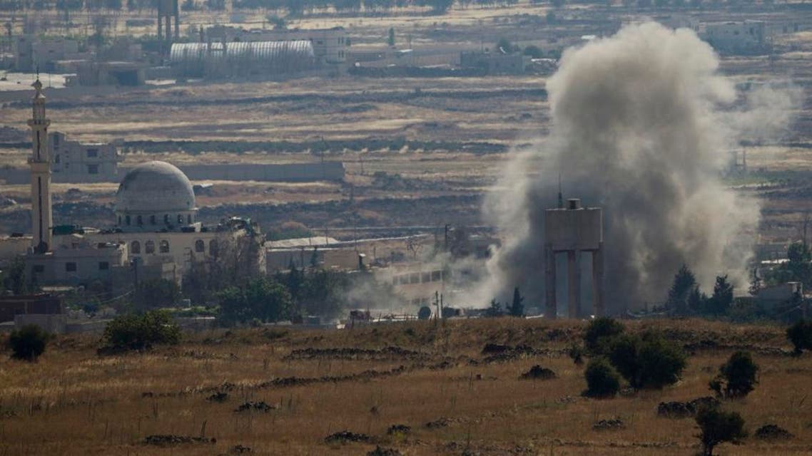 Smoke and explosions from the fighting between forces loyal to Syrian President Bashar Assad and rebels, in the Quneitra area, seen from the Israeli controlled Golan Heights, Wednesday, June 17, 2015. Syrian rebels attacked government troops’ positions Wednesday near the Golan Heights in what appears to be an attempt by insurgents to capture more areas south of Syria from President Bashar Assad’s forces, activists said. (AP Photo/Ariel Schalit)