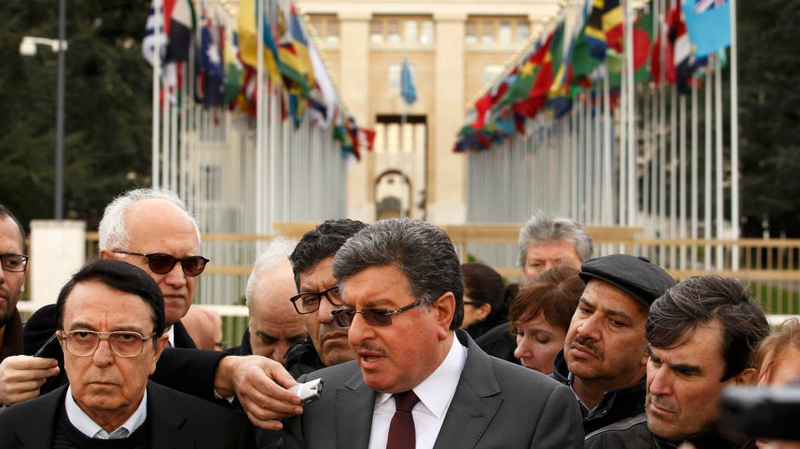Salim al-Muslat (C) spokesman for the High Negotiations Committee (HNC) and Riad Naasam Agha, member of HNC deliver a statement during the Geneva Peace talks outside the United Nations in Geneva, Switzerland, February 2, 2016. reuters