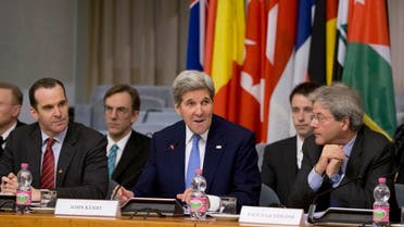 U.S. Secretary of State John Kerry, center, is flanked by special presidential envoy to the U.S.-led coalition against the Islamic State group, Brett McGurk, left, and Italian Foreign Minister Paolo Gentiloni, during a 23-nation conference, in Rome, Tuesday, Feb. 2, 2016 (AP)