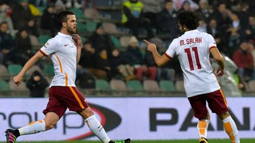 Roma's Mohamed Salah, right, celebrates with his teammate Miralem Pjanic, after scoring against Sassuolo during their Italian Serie A soccer match at Mapei stadium in Reggio Emilia, Italy, Tuesday, Feb. 2, 2016. AP