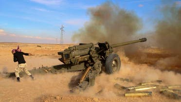 In this photo taken on Saturday, Jan. 30, 2016, Syrian government troops fire at Islamic State group positions near Mahin, Syria. The nearly five-year Syrian conflict has left at least 250,000 people dead, forced millions to flee the country and given an opening to the Islamic State group to capture territory in Syria and Iraq. It has drawn in U.S. and Russia, as well as regional powers such as Turkey, Saudi Arabia and Iran. (Alexander Kots/Komsomolskaya Pravda via AP)