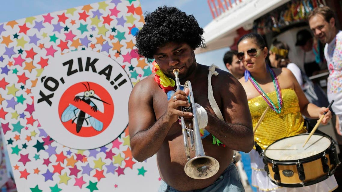 Musicians play samba at a street carnival parade during which health workers distributed kits with information about the Zika virus, on Ipanema beach in Rio de Janeiro. (AP)