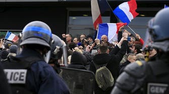 Anti-migrant protesters arrested at banned rally in Calais