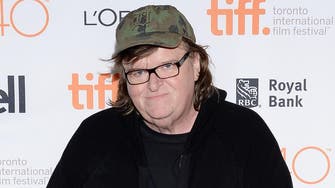 Filmmaker Michael Moore hospitalized with pneumonia