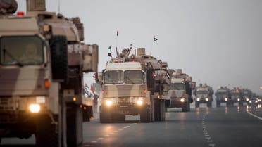 In this photo made available by the Emirates News Agency, WAM, a convoy of UAE military vehicles and personnel travels from Al Hamra Military Base to Zayed Military City, marking the return of the first batch of UAE Armed Forces military personnel from Yemen, United Arab Emirates, Saturday, Nov. 7, 2015. AP