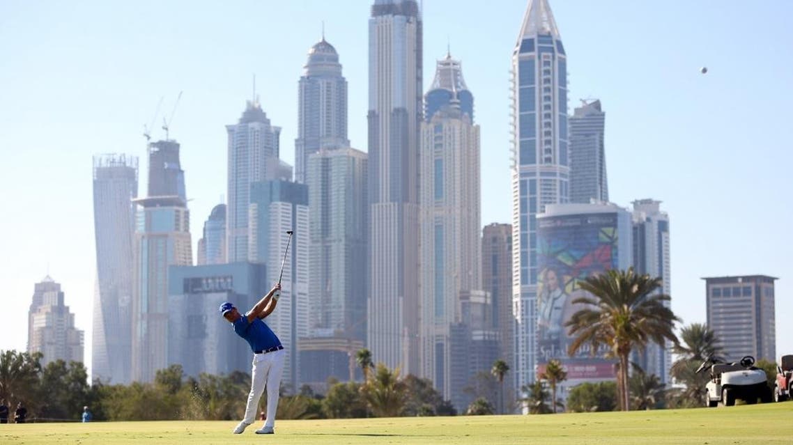 Danny Willett of England plays a shot on the 13th hole during final round of the Dubai Desert Classic golf tournament in Dubai, United Arab Emirates, Sunday, Feb. 7, 2016. (AP Photo/Kamran Jebreili)