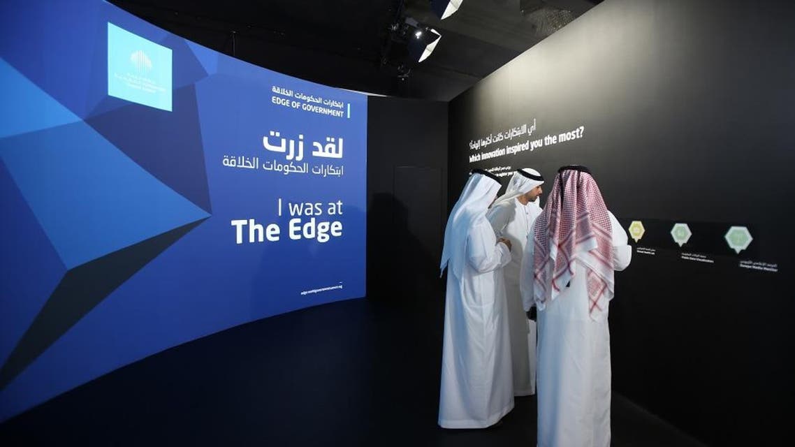 Emirati officials visit an exhibition during the opening day of the World Government Summit in Dubai, United Arab Emirates, Monday, Feb. 8, 2016. Those gathered for the World Government Summit in Dubai offered no immediate solutions to the crises gripping the region, like low global oil prices, global warming and the rise of violent extremism. But all acknowledged that keeping government responsive to its citizens remains crucial. (AP Photo/Kamran Jebreili)
