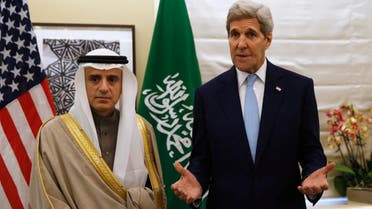 U.S. Secretary of State John Kerry, right, speaks during his meeting with Saudi Arabia's Foreign Minister, Adel al-Jubeir, in London Thursday, Jan. 14, 2016. The two met to discuss Syria and Iran and condemned the bombings in Jakarta. (Kevin Lamarque/Pool Photo via AP)