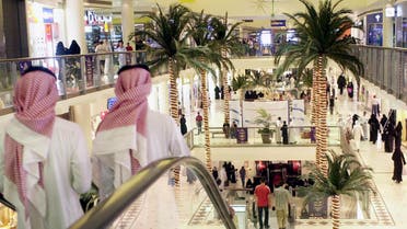  Saudis stroll in a shopping mall in Riyadh, Saudi Arabia, on Friday Oct. 31, 2003. Nightlife picks up during the Islamic holy month of Ramadan, with families heading to shopping malls, restaurants and visiting friends and relatives homes after breaking the day long fast. (AP Photo/Hasan Jamali)