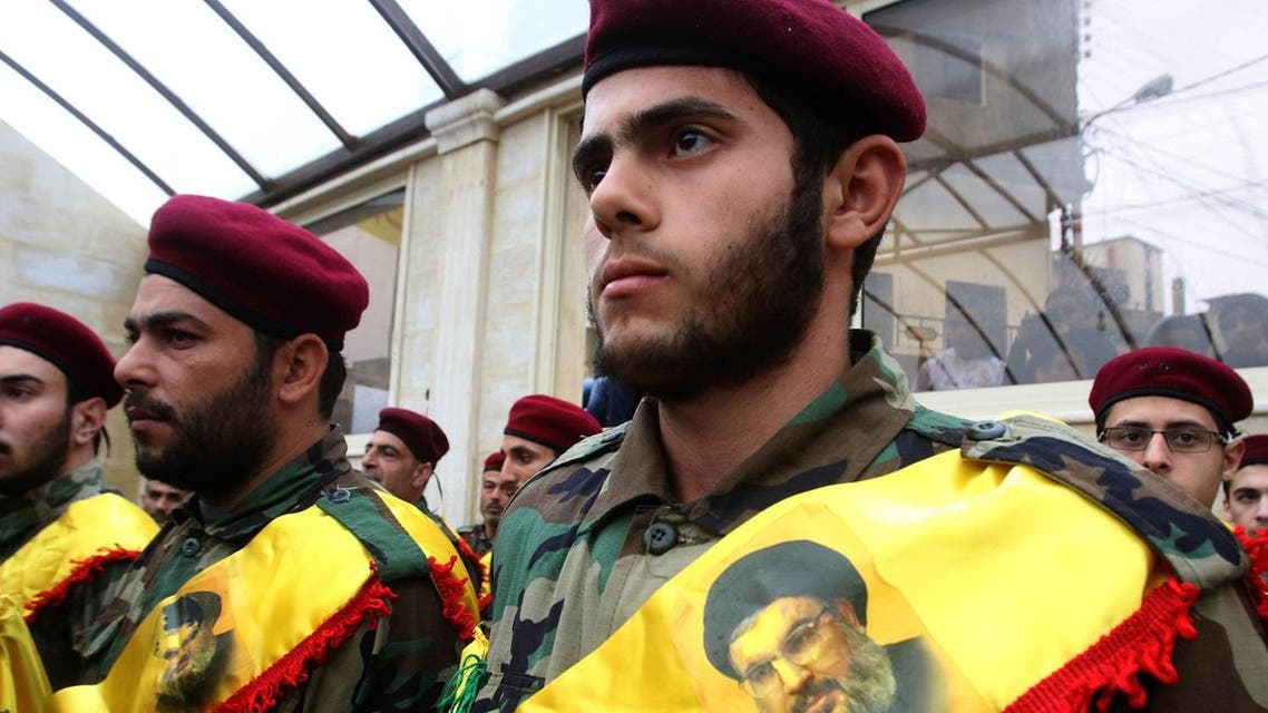 Members of Lebanon's militant Shiite Muslim movement Hezbollah attend the funeral of Ali Ahmed Sabra, a fellow militant who was killed in combat alongside Syrian government forces in Aleppo. (AFP)
