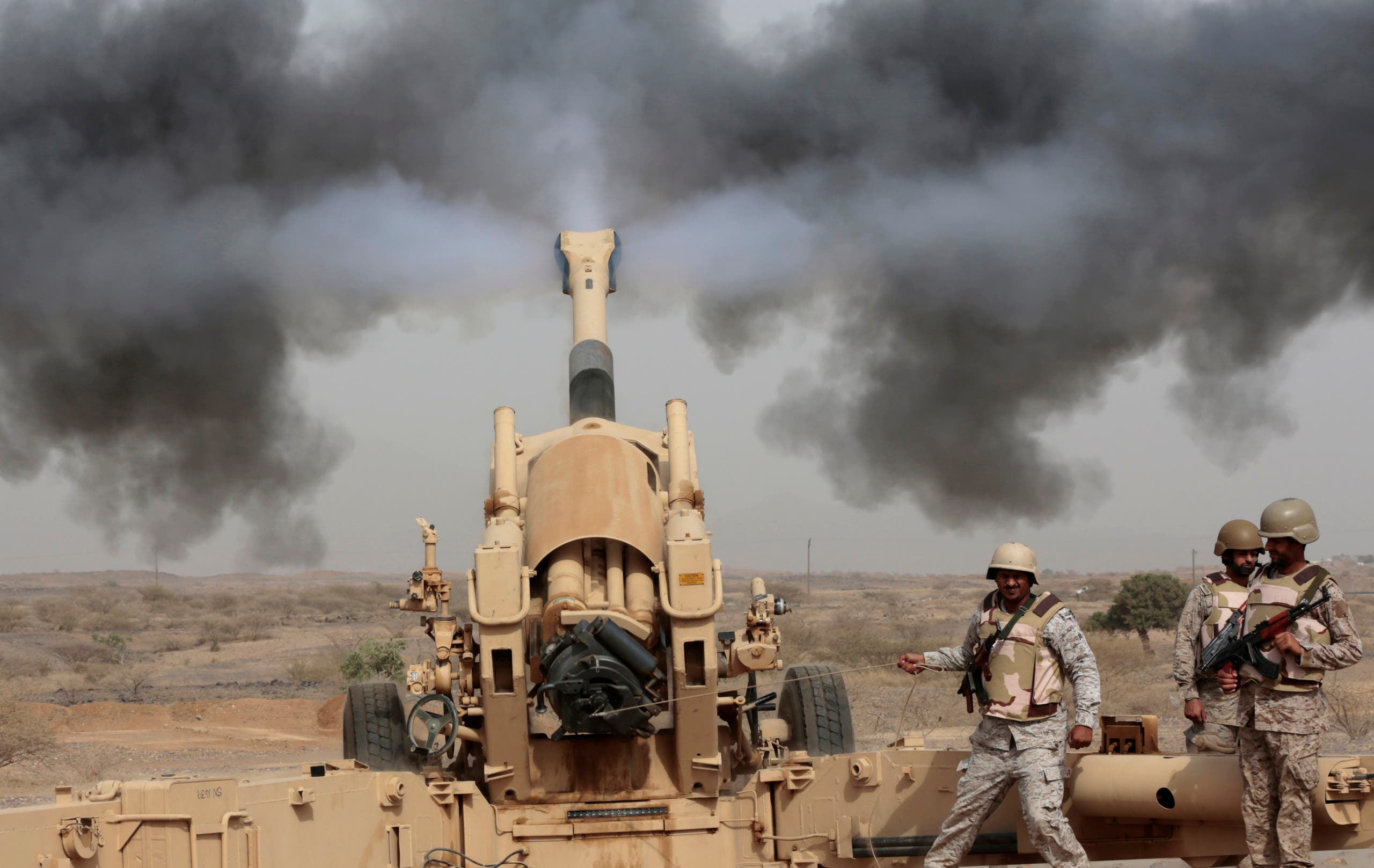 In this April 20, 2015 file photo, Saudi soldiers fire artillery toward three armed vehicles approaching the Saudi border with Yemen in Jazan, Saudi Arabia. (AP)