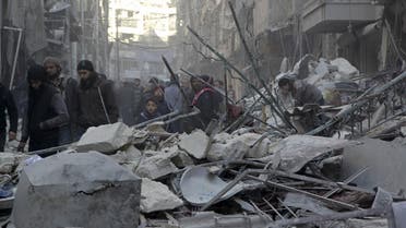 Residents inspect damage after airstrikes by pro-Syrian government forces in the rebel held Al-Shaar neighborhood of Aleppo, Syria February 4, 2016. 