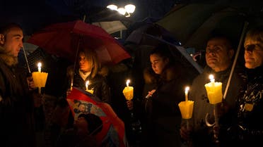 People gather during a candle light procession to honor the memory of Giulio Regeni in Fiumicello, Italy, Sunday, Feb. 7, 2016. (AP)