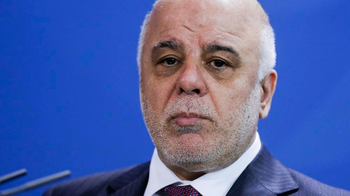 Iraqi Prime Minister Haider al-Abadi attends a joint press conference with German Chancellor Angela Merkel at the chancellery in Berlin, Thursday, Feb. 11, 2016. (AP Photo/Markus Schreiber)