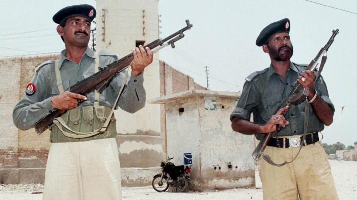 Pakistani policemen guard the central jail in Hyderabad, 160 km (100 miles) from Karachi, in this July 10, 2002 file photo. (Reuters)