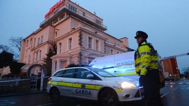 An Irish police officer at the cordon sealing off the Regency Airport Hotel in Dublin on February 5, 2016 following a shooting (AFP)