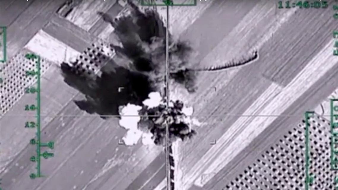In this photo made from the footage taken from Russian Defense Ministry official web site on Monday, Feb. 1, 2016, an aerial image shows what it says is a column of heavy trucks carrying ammunition hit by a Russian air strike near Aleppo, Syria. (AP)