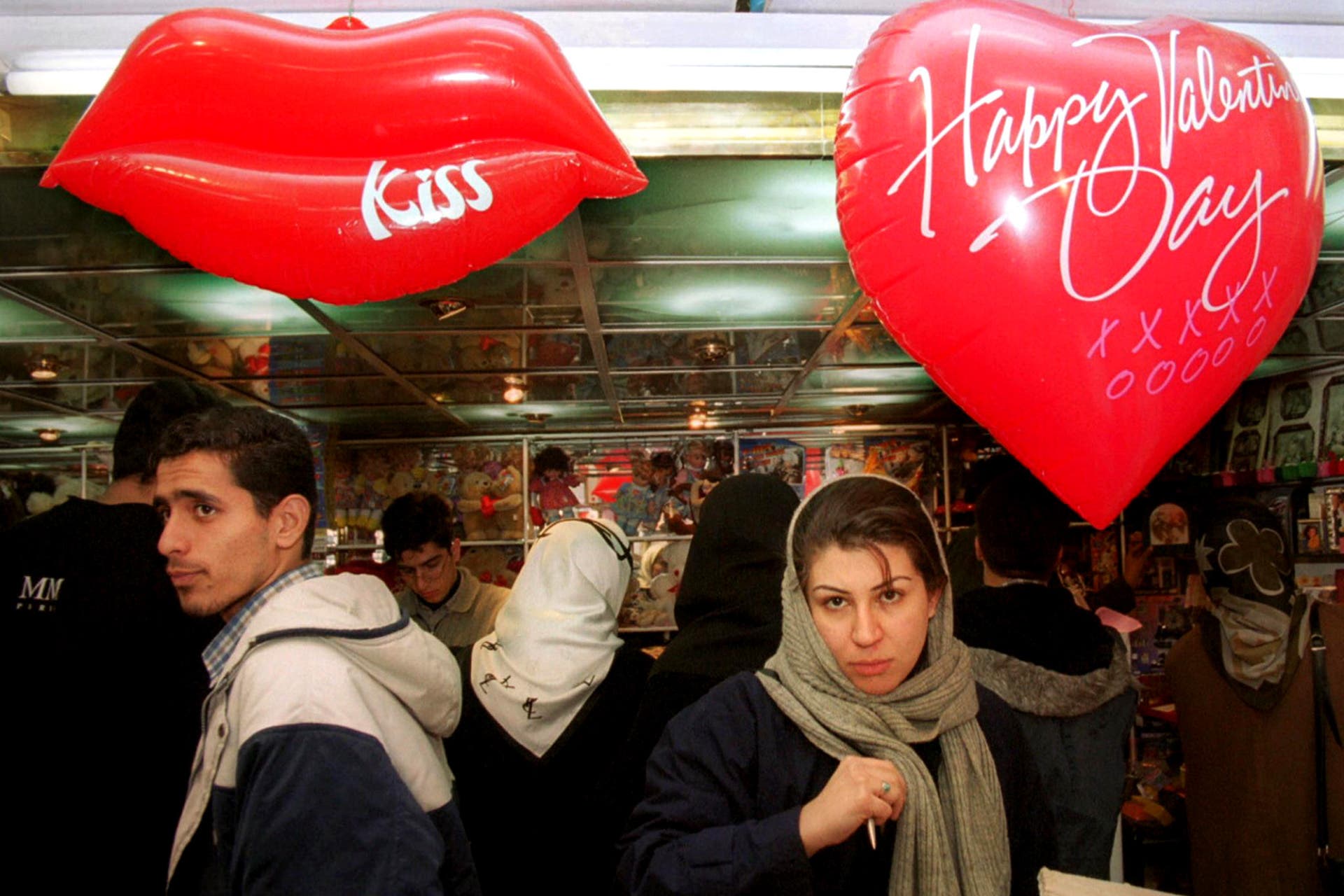 Iranians shop for Valentine's Day gifts at a shop in Tehran in 2001. (AFP)