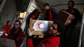 Aid convoy enters rebel-held area near Syrian capital
