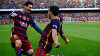 Messi passes on penalty, serves up Suarez hat-trick
