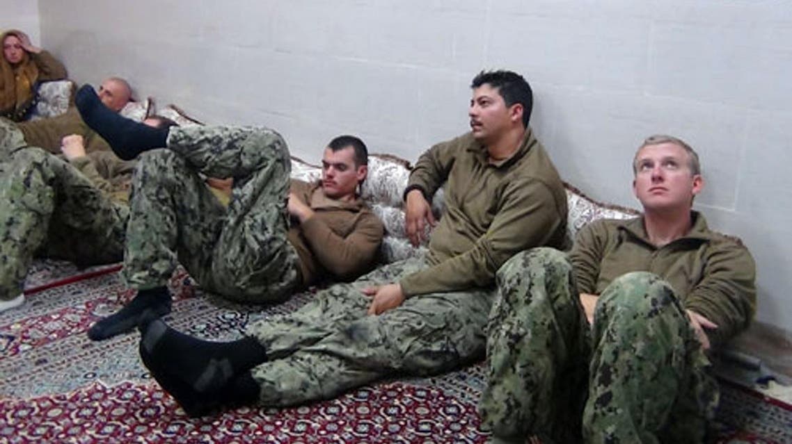 This picture released by the Iranian Revolutionary Guards on Wednesday, Jan. 13, 2016, shows detained American Navy sailors in an undisclosed location in Iran. (AP)