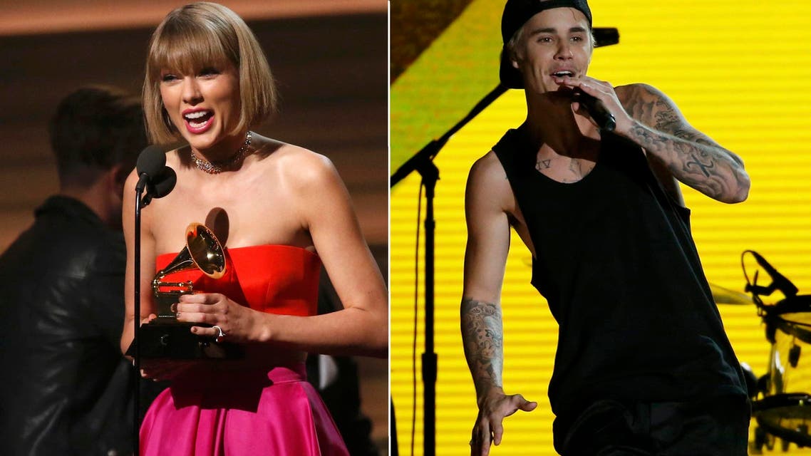 Justin Bieber performs "Where are U Now" with Jack U; Taylor Swift accepts the award for Album of the Year for "1989." (Reuters)