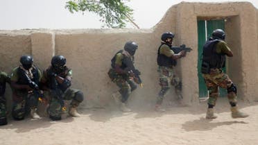 Nigerian special forces participate in an hostage rescue exercise at the end of the Flintlock exercise in Mao, Chad, Saturday, March 7, 2015. The U.S. military and its Western partners conduct this training annually and set up plans long before Boko Haram began attacking its neighbors Niger, Chad and Cameroon. (AP Photo/Jerome Delay)