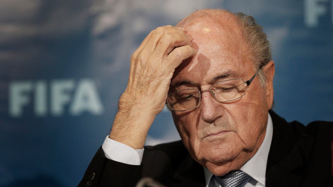 FILE - In this Dec. 19, 2014 file photo FIFA President Sepp Blatter gestures as he attends a news conference in Marrakech, Morocco. The FBI is investigating Blatter's role in a kickbacks scandal that involved his predecessor as FIFA president, Joao Havelange, the BBC reported Sunday, Dec. 6, 2015. (AP Photo/Christophe Ena, File)