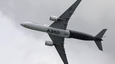 An Airbus A350 flies past during a preview aerial display of the Singapore Airshow at Changi exhibition center in Singapore February 14, 2016. The airshow will take place from February 16-21. REUTERS/Edgar Su