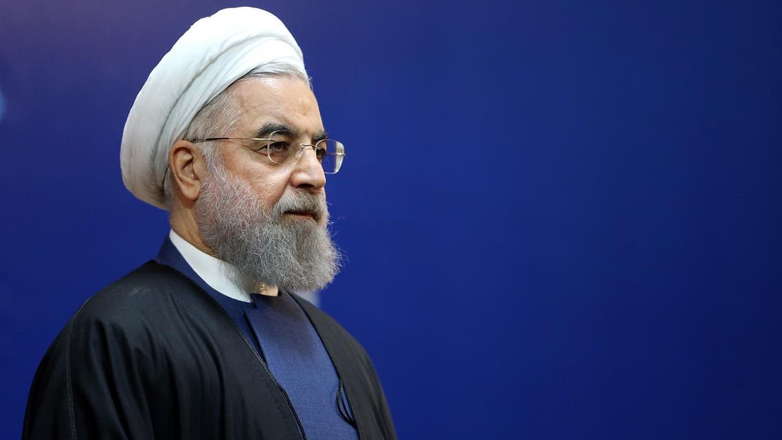 Iranian President Hassan Rowhani attends a ceremony while awarding medals of honor to its nuclear negotiators who helped clinch a landmark deal with world powers last year, in Tehran. (AP)
