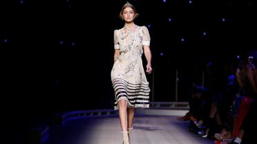 Gigi Hadid models a dress from the Tommy Hilfiger Fall 2016 collection during Fashion Week. (AP)