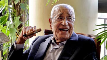 In this Sept. 19, 2015 photo, Mohamed Heikal jokes with friends days before his 92nd birthday at his house, in Cairo, Egypt. (AP)