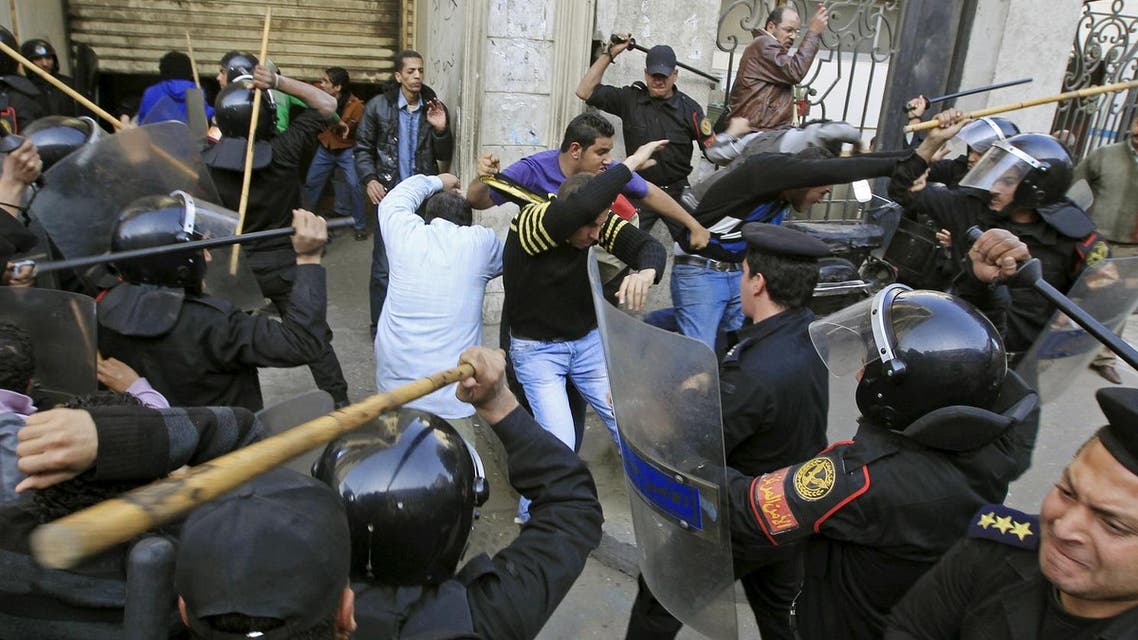 Riot police clash with protesters in Cairo January 26, 2011. Five years ago thousands of protesters took to the streets demanding the end of the 30-year reign of President Mubarak as Egypt became the second country to join the Arab Spring. (Reuters)