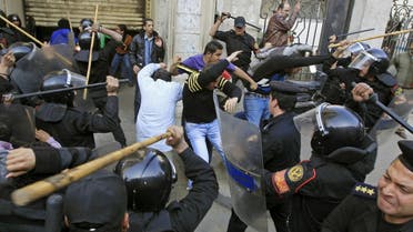 Riot police clash with protesters in Cairo, Jan. 26, 2011. (Reuters)