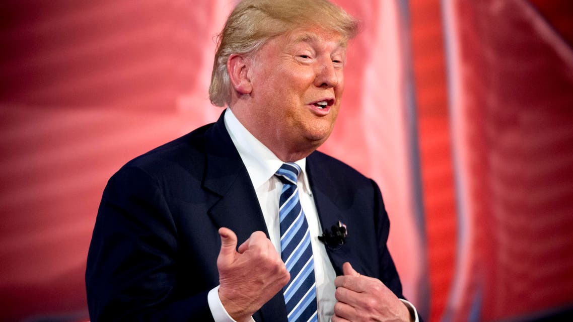 Republican presidential candidate Donald Trump speaks to members of the audience during a commercial break at a CNN town hall in Columbia, South Carolina, Feb. 18, 2016. (AP)