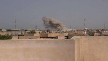 In this Friday, July 17, 2015 photo, smoke rises after a bombing as Iraqi security forces backed by Shiite and Sunni pro-government fighters attack Islamic State group position in Fallujah, 40 miles (65 kilometers) west of Baghdad, Iraq. (AP)