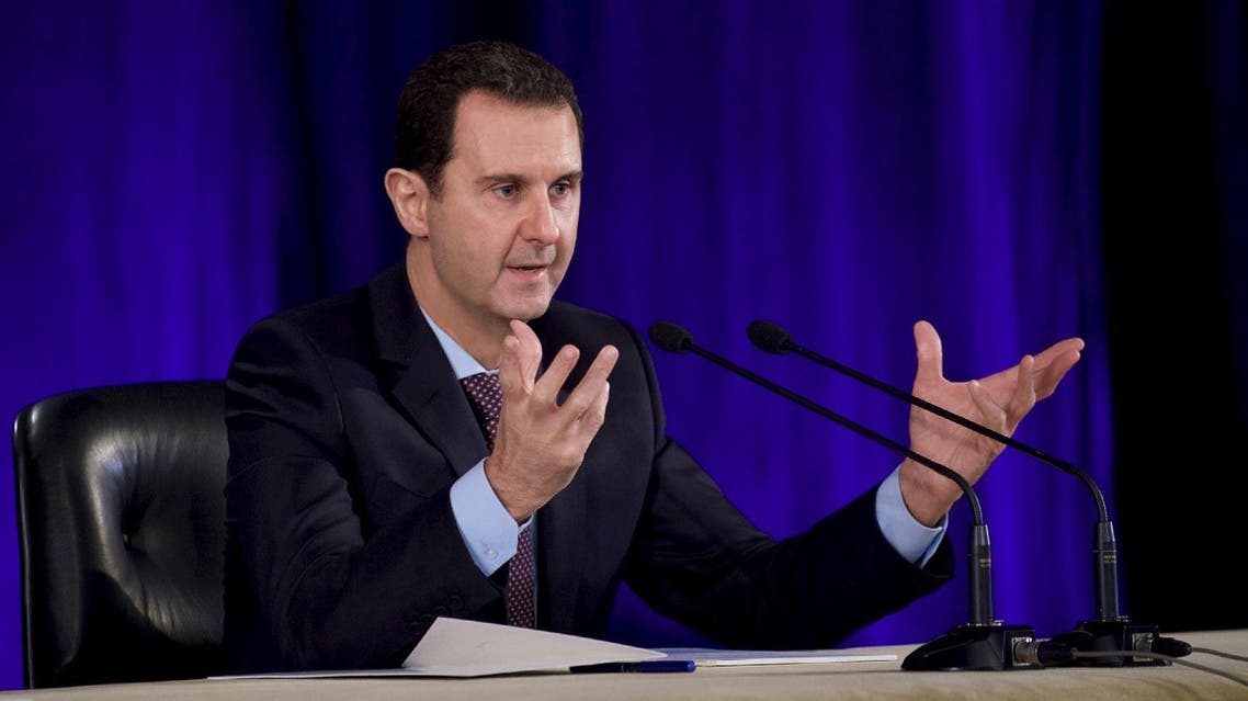 Syria's President Bashar al-Assad speaks during a meeting with members of the Central Bar Association in Damascus, in this handout picture provided by SANA on February 15, 2016. REUTERS