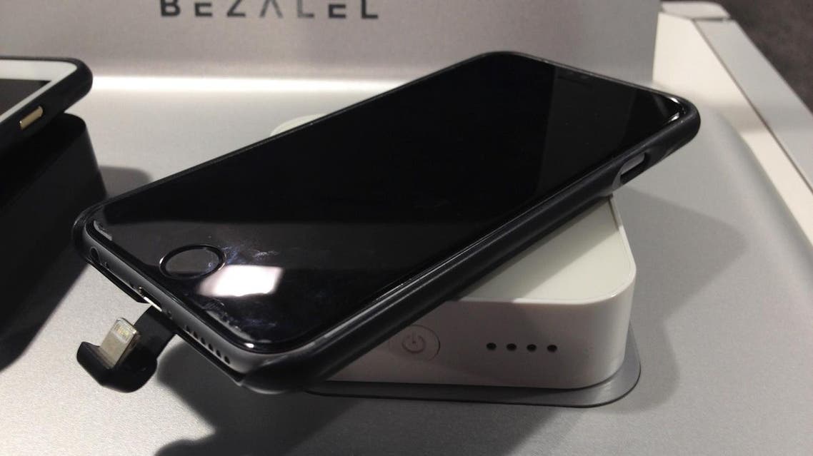 In this Thursday, Jan. 7, 2016, photo, a charging case for an iPhone 6 sits on a wireless charger, both made by Bezalel, at the Sands Expo during the CES International gadget show in Las Vegas. (AP)