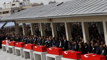 Turkish flag-draped coffins of the victims of Feb. 18's's car bombing, are placed at Kocatepe mosque during a funeral ceremony in Ankara