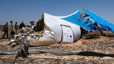Russian officials visit the crash site of a A321 Russian airliner in Wadi al-Zolomat, a mountainous area of Egypt's Sinai Peninsula on November 1, 2015 (AFP)