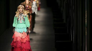 Models present creations from the Gucci Autumn/Winter 2016 woman collection during Milan Fashion Week, Italy, February 24, 2016. REUTERS