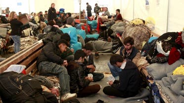 The plans involve using special centers to quickly process migrants who have little realistic chance of winning asylum (AP)