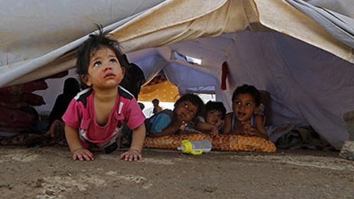 أطفال عراقيون في مخيمات الاجئين - أرشيفية