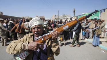 A Houthi militant carries his weapon during the funerals of Lutf al-Quhum, a prominent pro-Houthi religious singer, and a Houthi fighter, in Yemen's capital Sanaa, February 18, 2016. (Reuters)