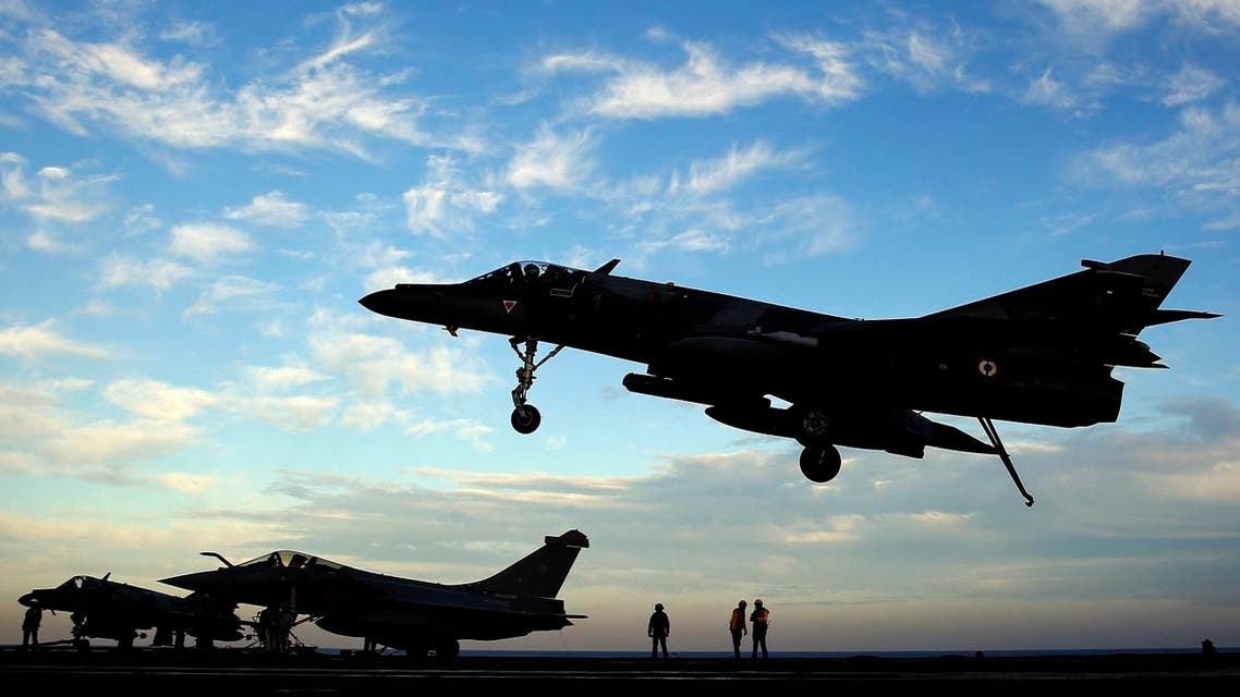 A Super Etendard fighter jet lands after a mission, on France's flagship Charles de Gaulle aircraft carrier in the Arabian Gulf. (File photo: AP)