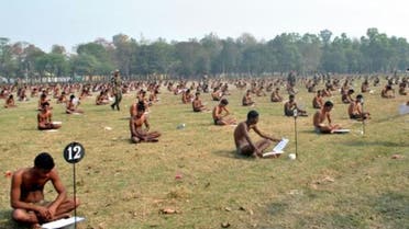 Images in the Indian Express showed dozens of men sitting cross-legged in a field clad only in underpants. (AFP)
