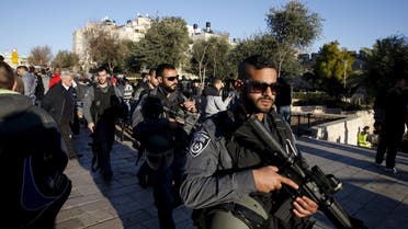 Israeli policemen patrol an area near the scene where three Palestinians were shot dead by Israeli police after carrying out what Israeli police spokesman said was a shooting and stabbing attack outside Damascus Gate to Jerusalem's Old City, in this February 3, 2016 file picture. REUTERS