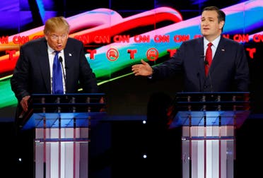 Republican U.S. presidential candidates Donald Trump (L) and Ted Cruz speak simultaneously as they discuss an issue during the debate sponsored by CNN for the 2016 Republican U.S. presidential candidates in Houston, Texas, February 25, 2016. REUTERS
