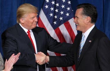 File photo of businessman and real estate developer Donald Trump greeting U.S. Republican presidential candidate and former Massachusetts Governor Romney after endorsing his candidacy for president at the Trump Hotel in Las Vegas. (Reuters)